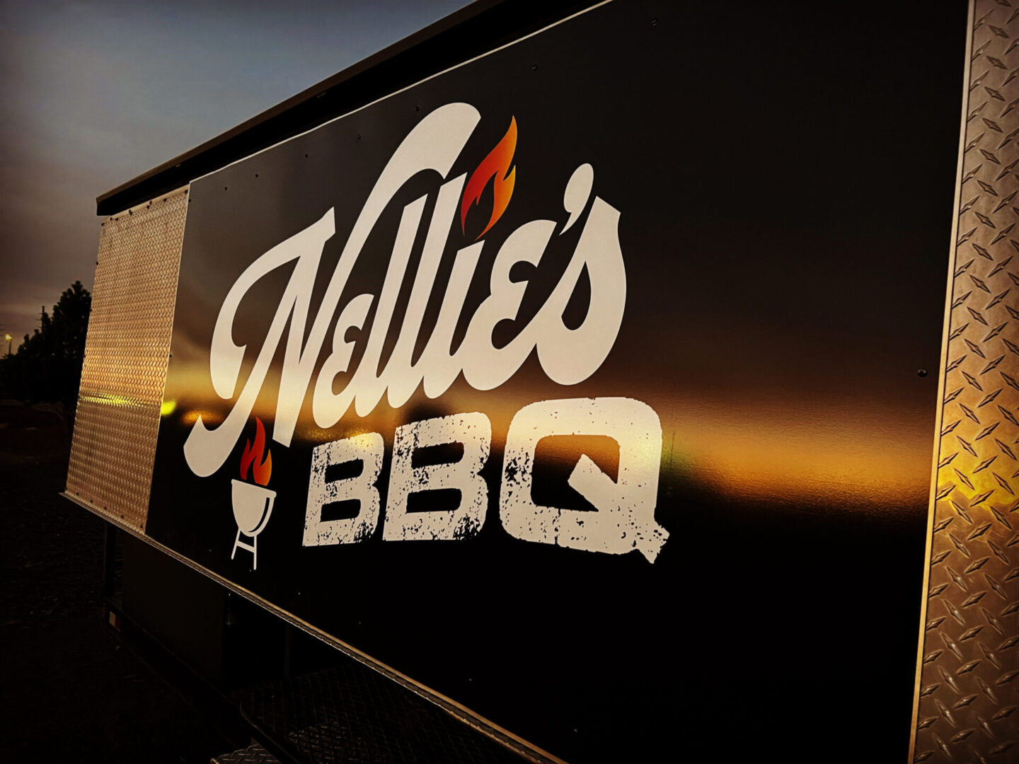 Nellie's BBQ sign
