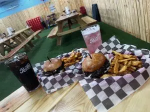 Smashburger with side of fries and drink