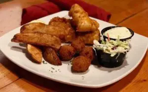 fried fish with slaw and potatoes